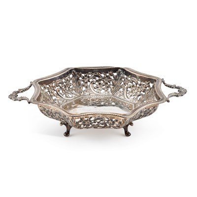 Lot 320 - AN EDWARDIAN PIERCED SILVER TWO-HANDLED DISH