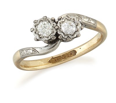 Lot 1732 - A DIAMOND TWO STONE CROSSOVER RING