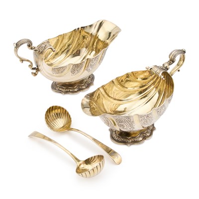 Lot 487 - A FINE PAIR OF GEORGE III SILVER-GILT SAUCEBOATS IN GEORGE II IRISH STYLE