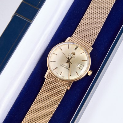 Lot 537 - A GENTS 9CT GOLD TISSOT BRACELET WATCH