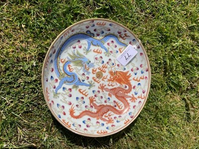 Lot 877 - A CHINESE IRON-RED AND ENAMEL 'DRAGON' DISH