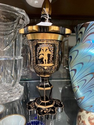 Lot 29 - A 19TH CENTURY GILDED GREEN GLASS GOBLET AND COVER