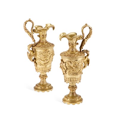 Lot 634 - A PAIR OF 19TH CENTURY BRONZE EWERS