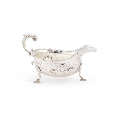 Lot 253 - AN UNUSUAL EDWARDIAN SILVER SAUCEBOAT