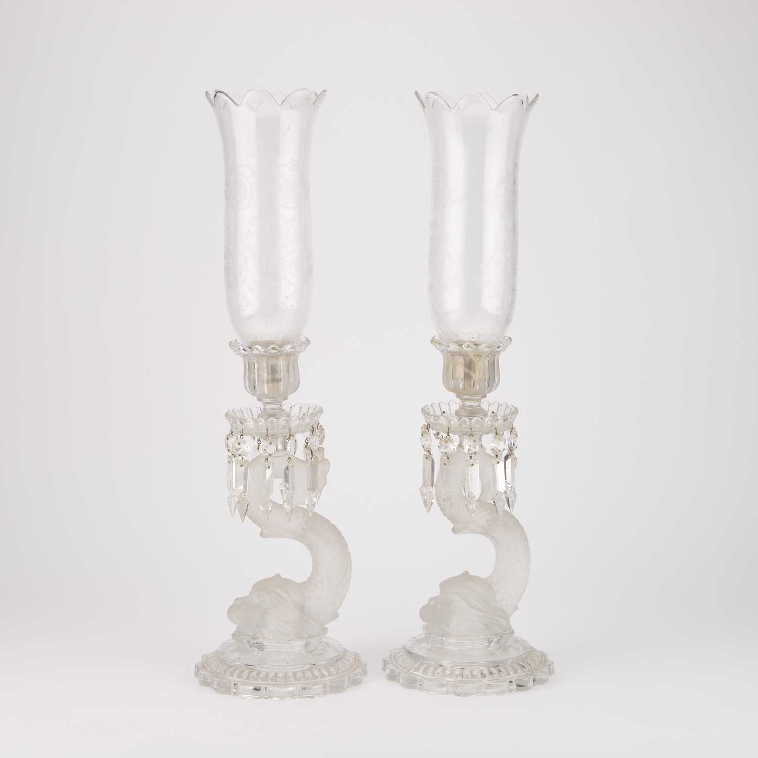 Lot 98 - A PAIR OF BACCARAT DOLPHIN LUSTRE-DROP CANDLESTICKS