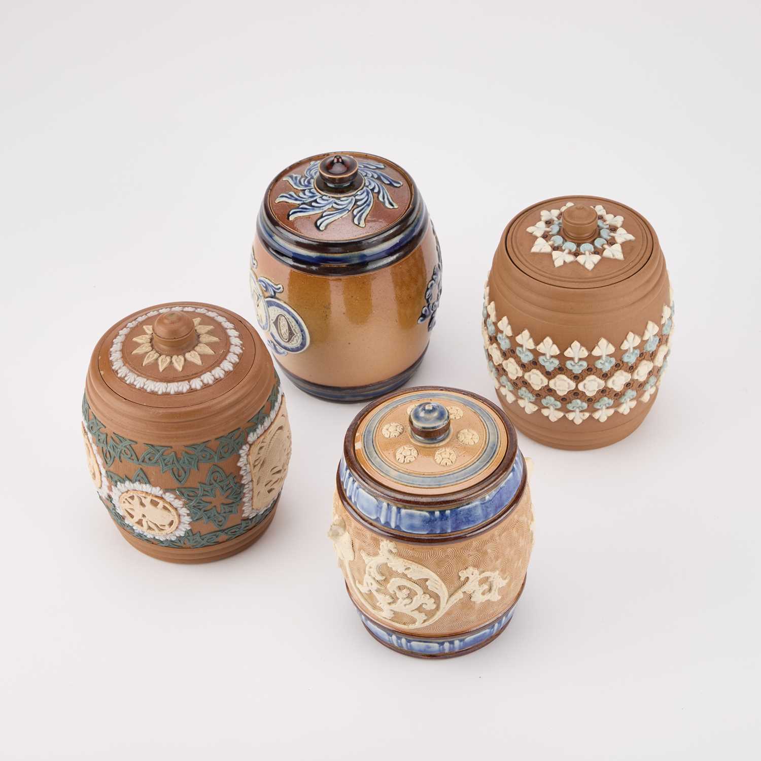 Lot 251 - FOUR DOULTON STONEWARE TOBACCO JARS