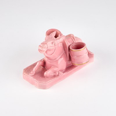 Lot 211 - A ROYAL WORCESTER PINK GLAZED DONKEY SALT CELLAR