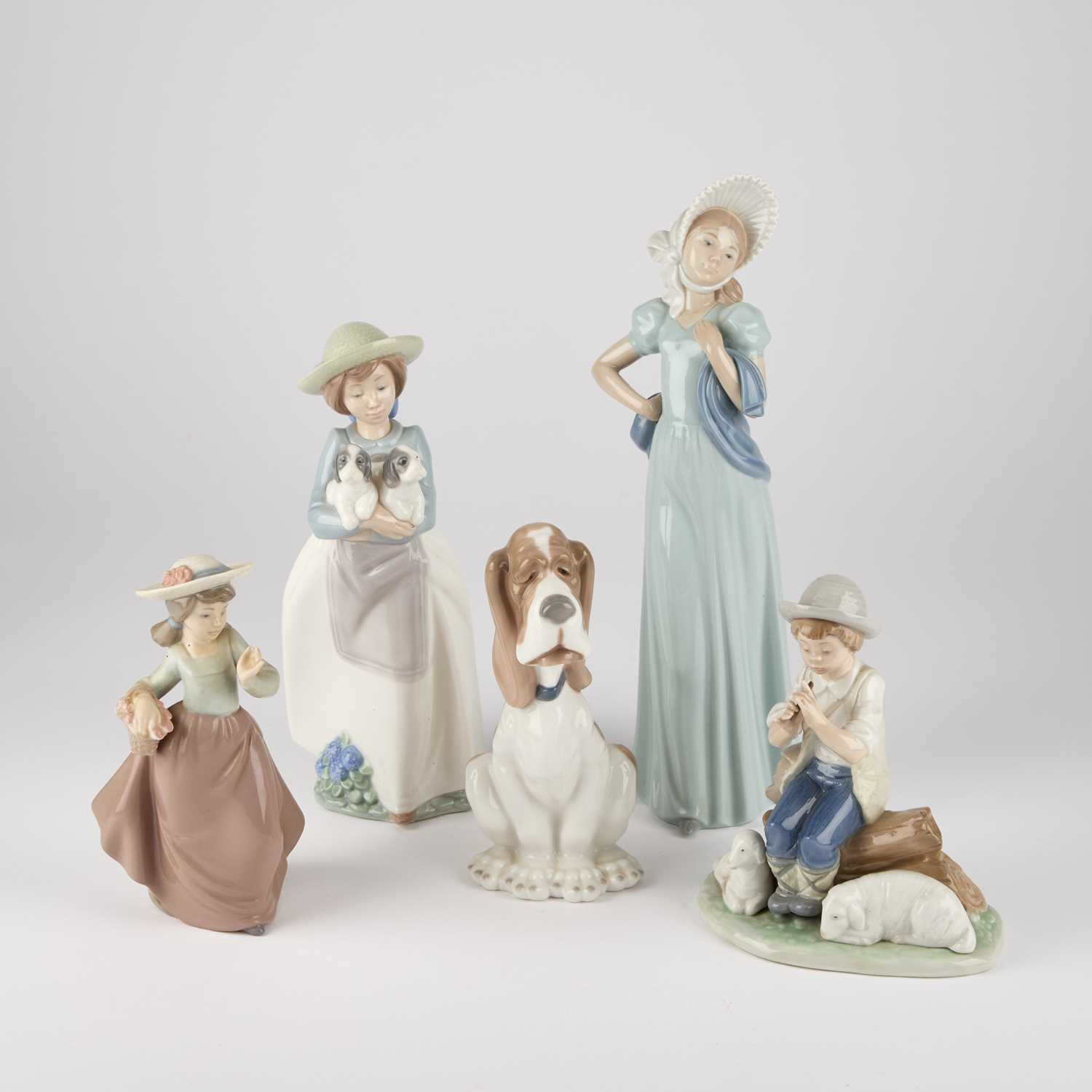 Lot 303 - FIVE NAO FIGURES