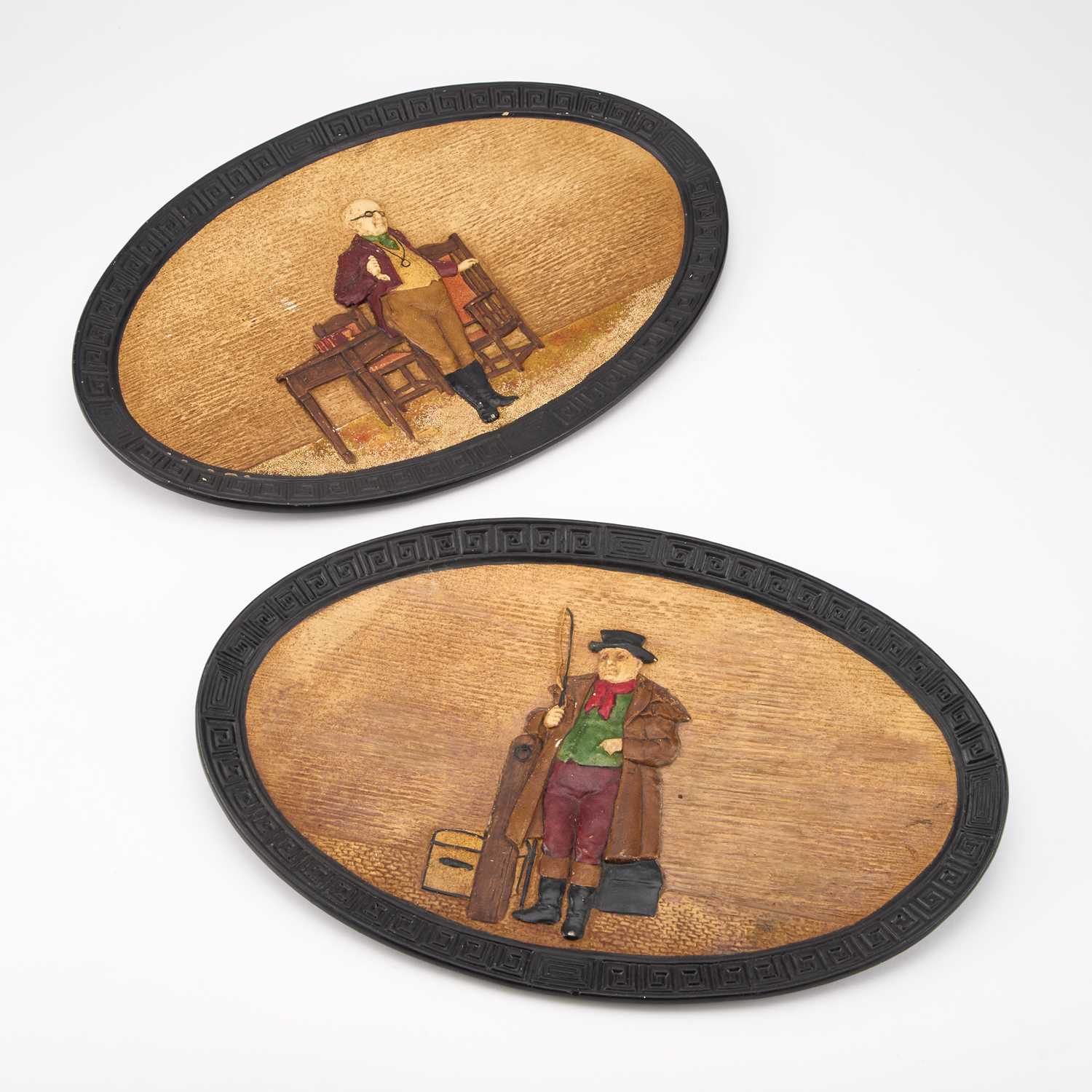 Lot 313 - A PAIR OF BRETBY OVAL DICKENSIAN WALL PLAQUES