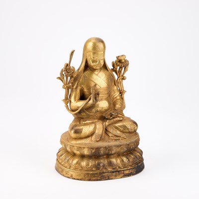 Lot 669 - A BRONZE BUDDHA