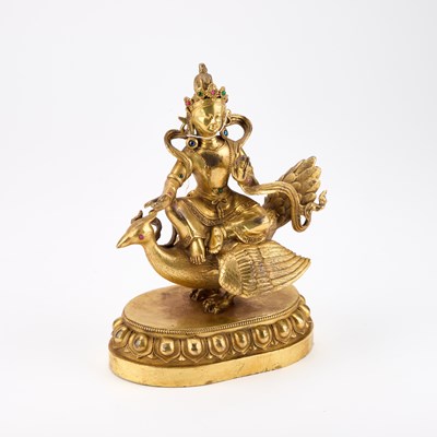 Lot 667 - A BRONZE BUDDHA