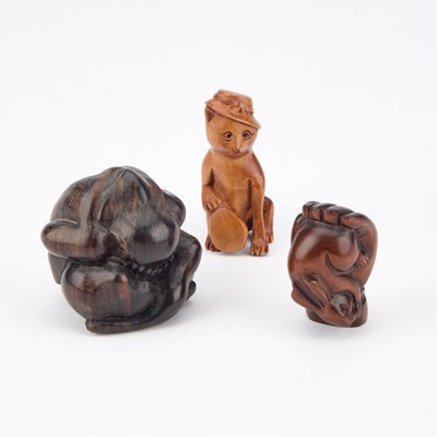 Lot 460 - THREE CARVED WOOD ANIMAL NETSUKES