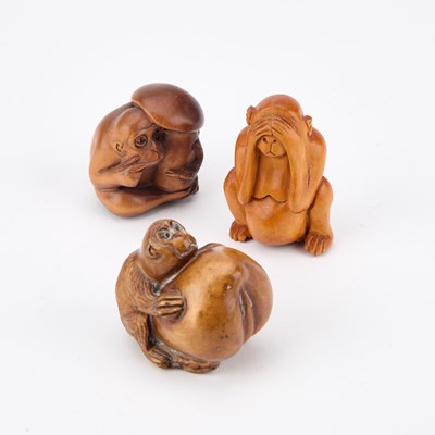 Lot 448 - THREE CARVED WOOD ANIMAL NETSUKES