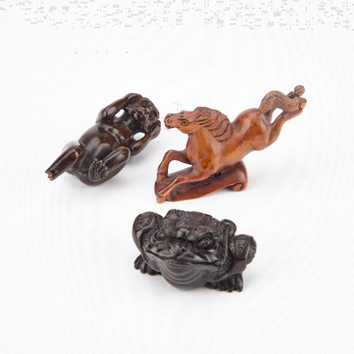 Lot 479 - THREE CARVED WOOD NETSUKES