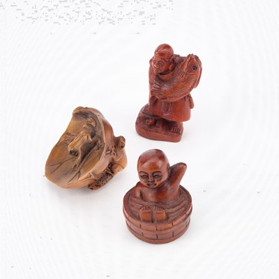 Lot 471 - THREE CARVED WOOD NETSUKES