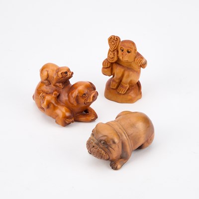 Lot 450 - THREE CARVED WOOD NETSUKES