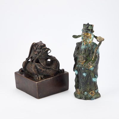 Lot 664 - A LARGE CHINESE BRONZE TABLE SEAL TOGETHER WITH A METAL FIGURE