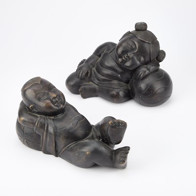 Lot 671 - A PAIR OF BRONZES OF SLEEPING CHILDREN