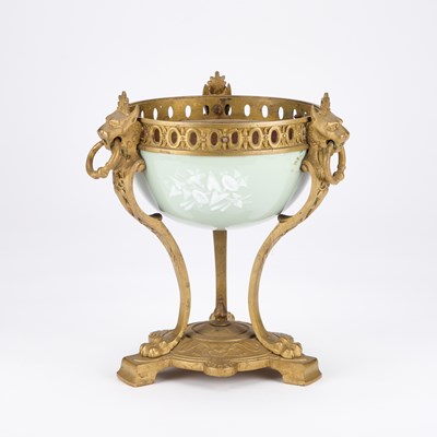 Lot 398 - A GILT-METAL MOUNTED PÂTE-SUR-PÂTE CENTREPIECE