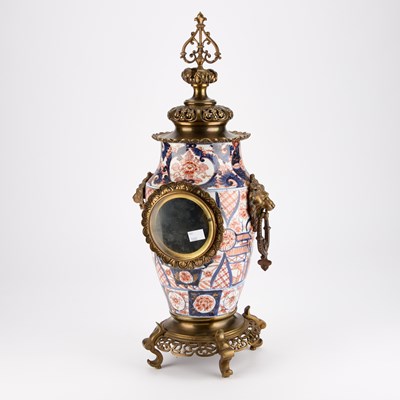 Lot 869 - A FRENCH BRASS AND IMARI PORCELAIN MANTEL CLOCK