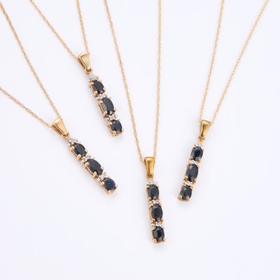 Lot 788 - FOUR SAPPHIRE SET PENDANTS