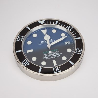 Lot 890 - AN ADVERTISING WALL CLOCK, SIGNED ROLEX DEEPSEA SEA-DWELLER