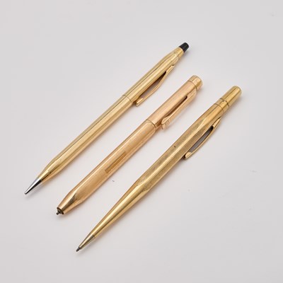 Lot 803 - THREE ROLLED GOLD PROPELLING PENCILS