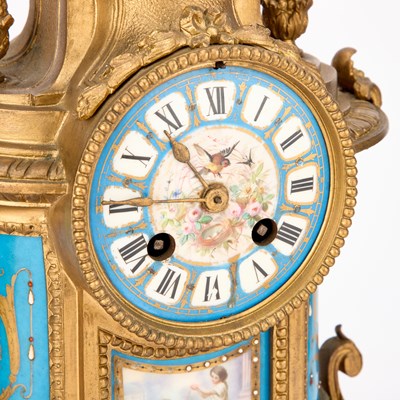 Lot 709 - A 19TH CENTURY FRENCH GILT-METAL AND PORCELAIN CLOCK GARNITURE
