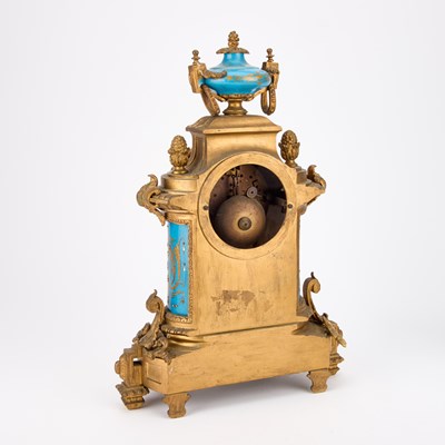 Lot 709 - A 19TH CENTURY FRENCH GILT-METAL AND PORCELAIN CLOCK GARNITURE