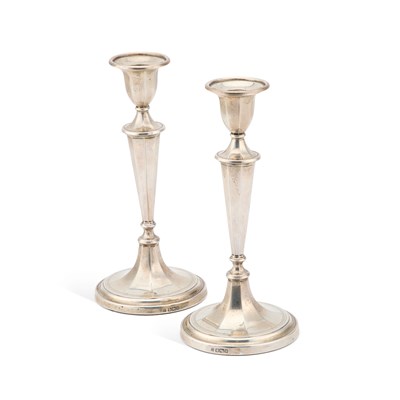 Lot 194 - A PAIR OF EDWARDIAN SILVER CANDLESTICKS