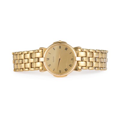 Lot 448 - A GENTS GOLD PLATED GUCCI BRACELET WATCH