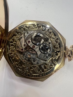 Lot 573 - A 14K GOLD WALTHAM OCTAGON OPERA POCKET WATCH