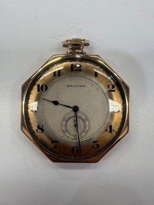 Lot 573 - A 14K GOLD WALTHAM OCTAGON OPERA POCKET WATCH