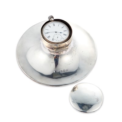 Lot 564 - A SILVER POCKET WATCH IN AN INKWELL STAND