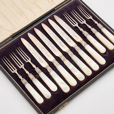 Lot 314 - A SET OF SIX VICTORIAN SILVER AND MOTHER-OF-PEARL HANDLED FRUIT KNIVES AND FORKS