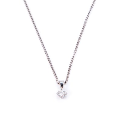 Lot 558 - AN 18 CARAT WHITE GOLD DIAMOND SOLITAIRE PENDANT NECKLACE