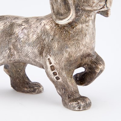 Lot 243 - AN ELIZABETH II HEAVY SILVER MODEL OF A DOG