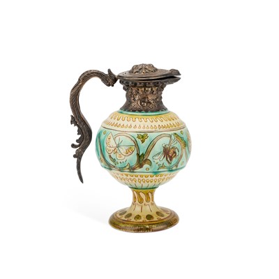 Lot 34 - A VICTORIAN SILVER-MOUNTED DELLA ROBBIA EWER