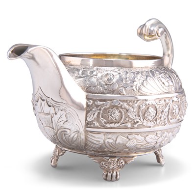 Lot 1148 - A GEORGE III SILVER CREAM JUG