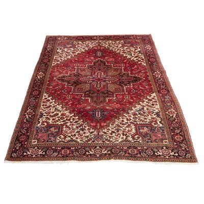 Lot 710 - A LARGE PERSIAN HERIZ CARPET, CIRCA 1970