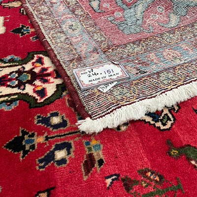 Lot A PERSIAN LILLIAN CARPET, CIRCA 1960