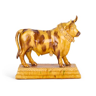 Lot 44 - A LARGE PORTUGUESE POTTERY FLASK IN THE FORM OF A BULL, 19TH CENTURY