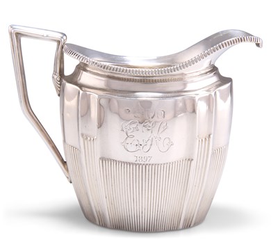 Lot 1143 - A LATE VICTORIAN SILVER CREAM JUG