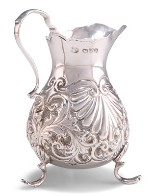 Lot 1142 - A LATE VICTORIAN SILVER CREAM JUG