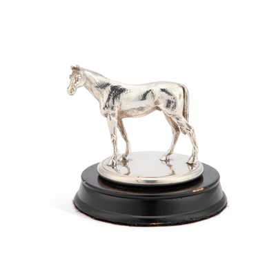 Lot 283 - A GEORGE V CAST SILVER MODEL OF A HORSE