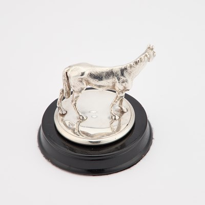 Lot 283 - A GEORGE V CAST SILVER MODEL OF A HORSE