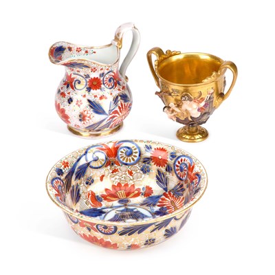 Lot 116 - A PARIS PORCELAIN JUG AND BOWL AND A NAPLES GILDED TWO-HANDLED VASE