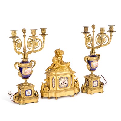 Lot 731 - A 19TH CENTURY FRENCH GILT-METAL CLOCK GARNITURE