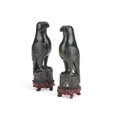 Lot A PAIR OF CHINESE SPINACH GREEN JADE MODELS OF BIRDS