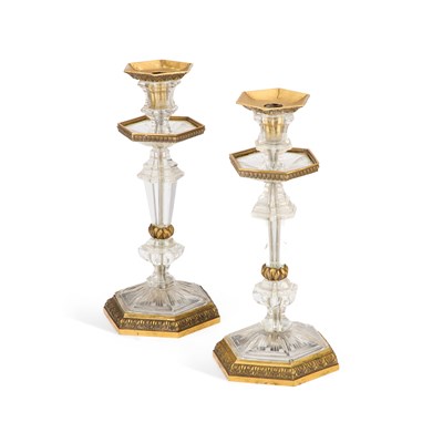 Lot A FINE PAIR OF 19TH CENTURY CARVED ROCK CRYSTAL AND ORMOLU CANDLESTICKS